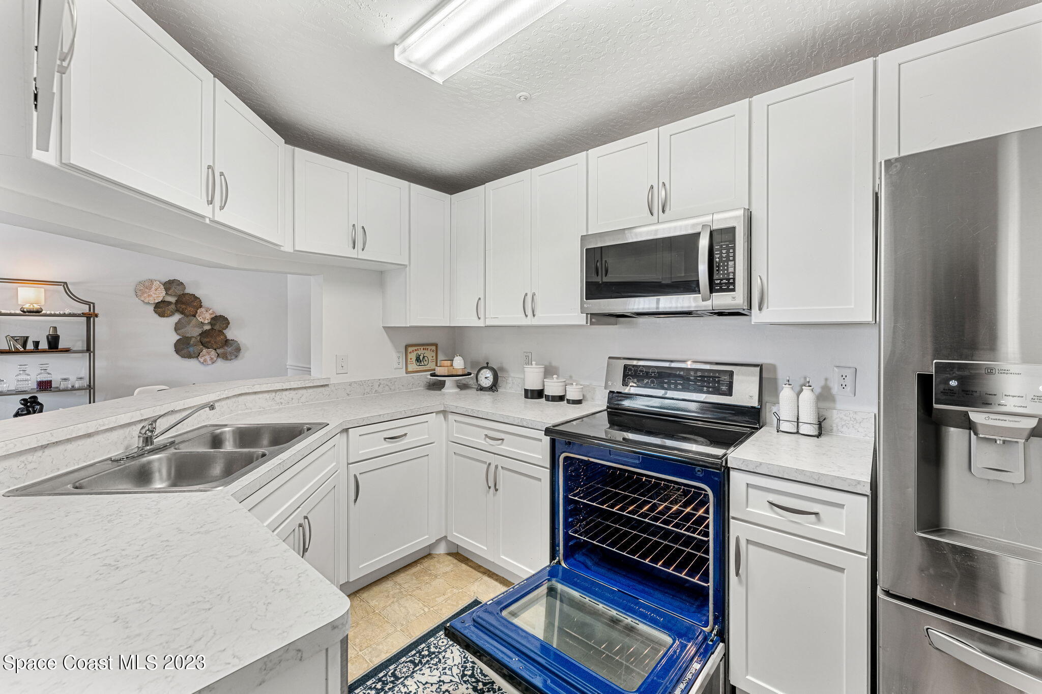 7667 North Wickham Road, Unit 1409 Melbourne, FL 32940 - Photo 12 of 32 Kitchen