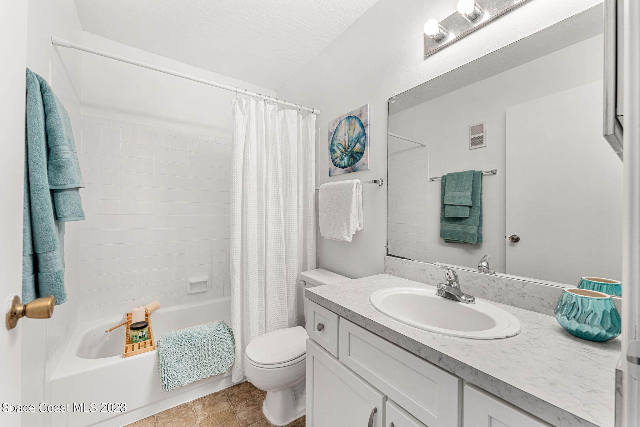 7667 North Wickham Road, Unit 1409 Melbourne, FL 32940 - Photo 21 of 32 Hall Bathroom