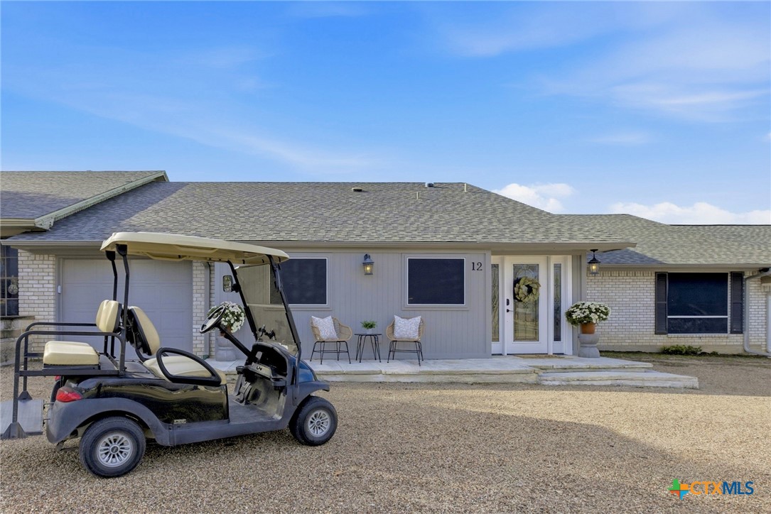 1710 Old Mill Road, Unit 12 Salado, TX 76571 - Photo 8 of 42 a view of a car with garage
