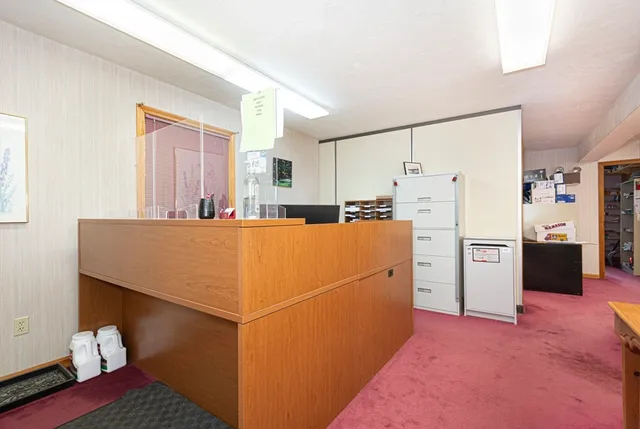 a kitchen with stainless steel appliances a refrigerator sink and cabinets