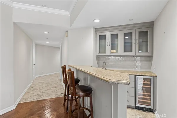 a view of a kitchen with dining area