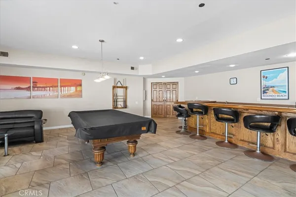 a view of a living room and kitchen