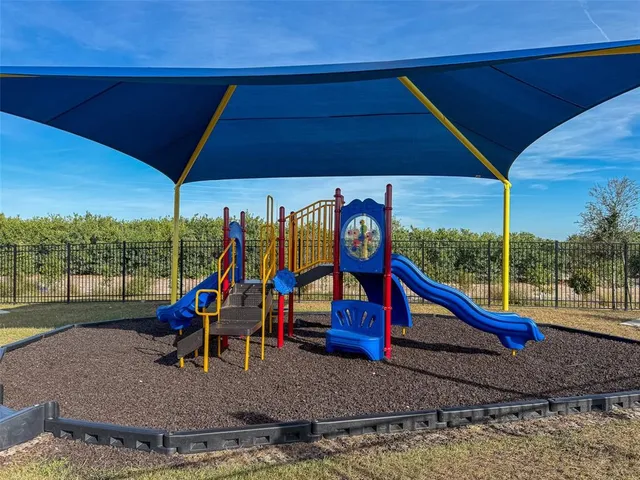 a view of a park with a slide