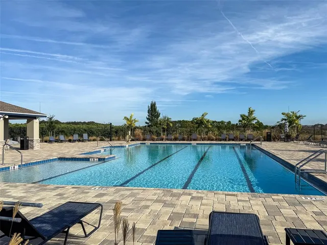 a view of swimming pool from a balcony