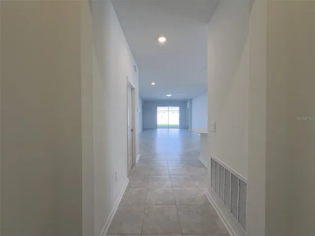 a view of hallway with stairs