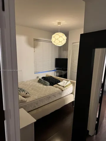 a kitchen with stainless steel appliances a stove and a refrigerator