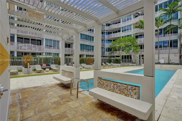 a room with a table and chairs