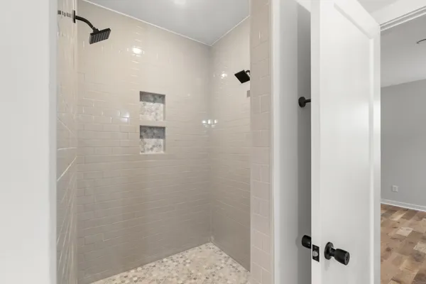 a room with a window and wooden floor