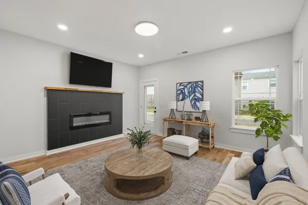 a kitchen with kitchen island a sink appliances and a counter top space