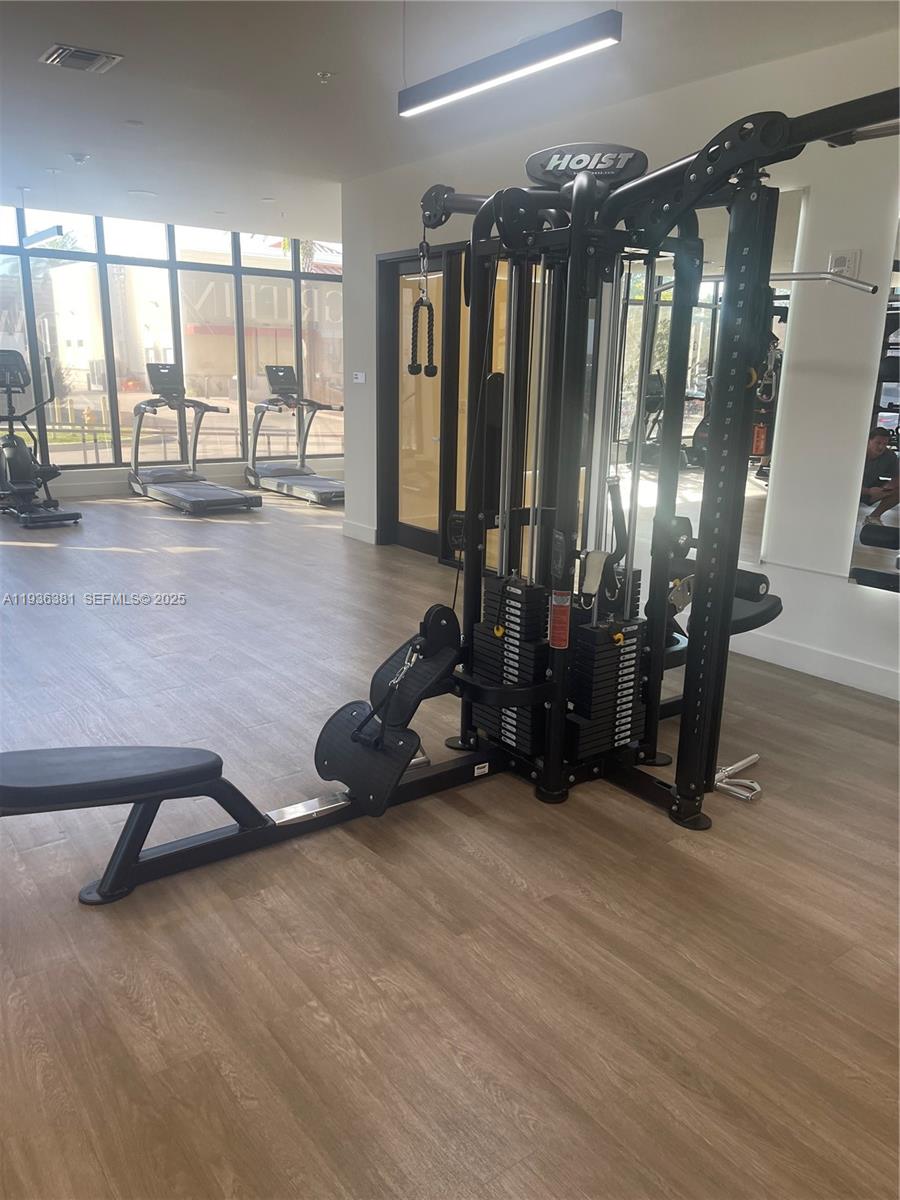 4465 Griffin Road, Unit 1 Hollywood, FL 33314 - Photo 13 of 13 a view of a room with gym equipment