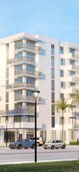 4465 Griffin Road, Unit 1 Hollywood, FL 33314 - Photo 2 of 13 a front view of a building with street view