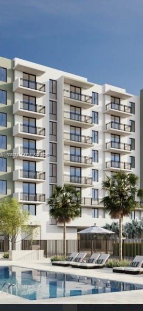 4465 Griffin Road, Unit 1 Hollywood, FL 33314 - Photo 3 of 13 a front view of a building with street view