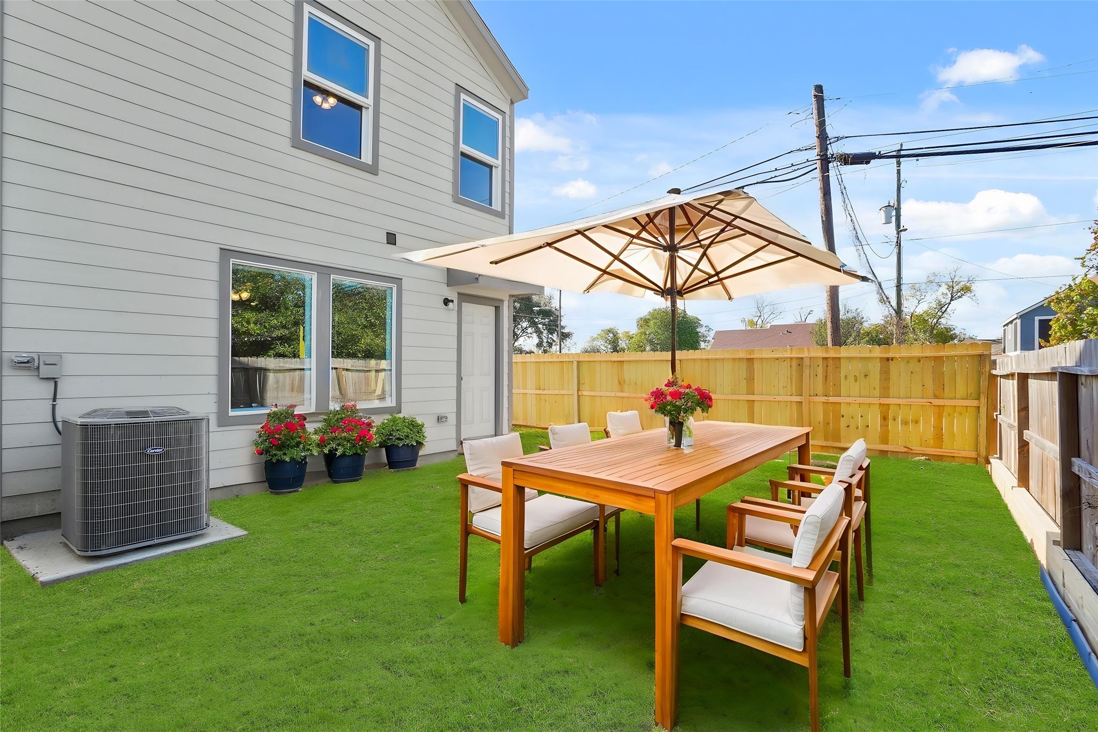 9005 Judwin Street Houston, TX 77075 - Photo 13 of 14 a patio with table and chairs