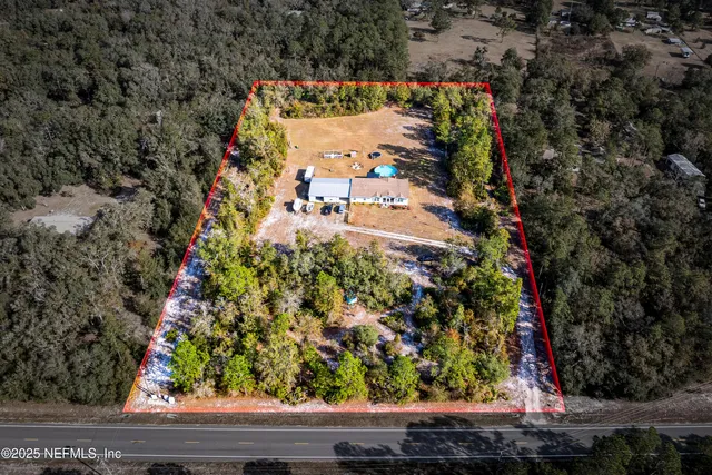 a view of a swimming pool with a lake view