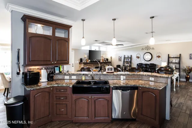 a bedroom with bed and wooden floor