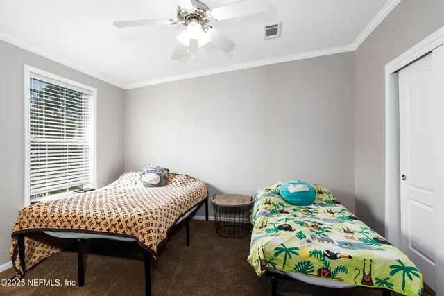 a bathroom with a toilet a sink and a mirror