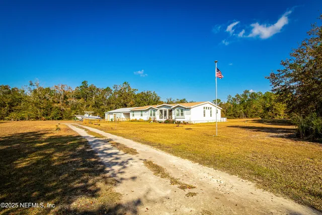 a front view of a house with swimming pool