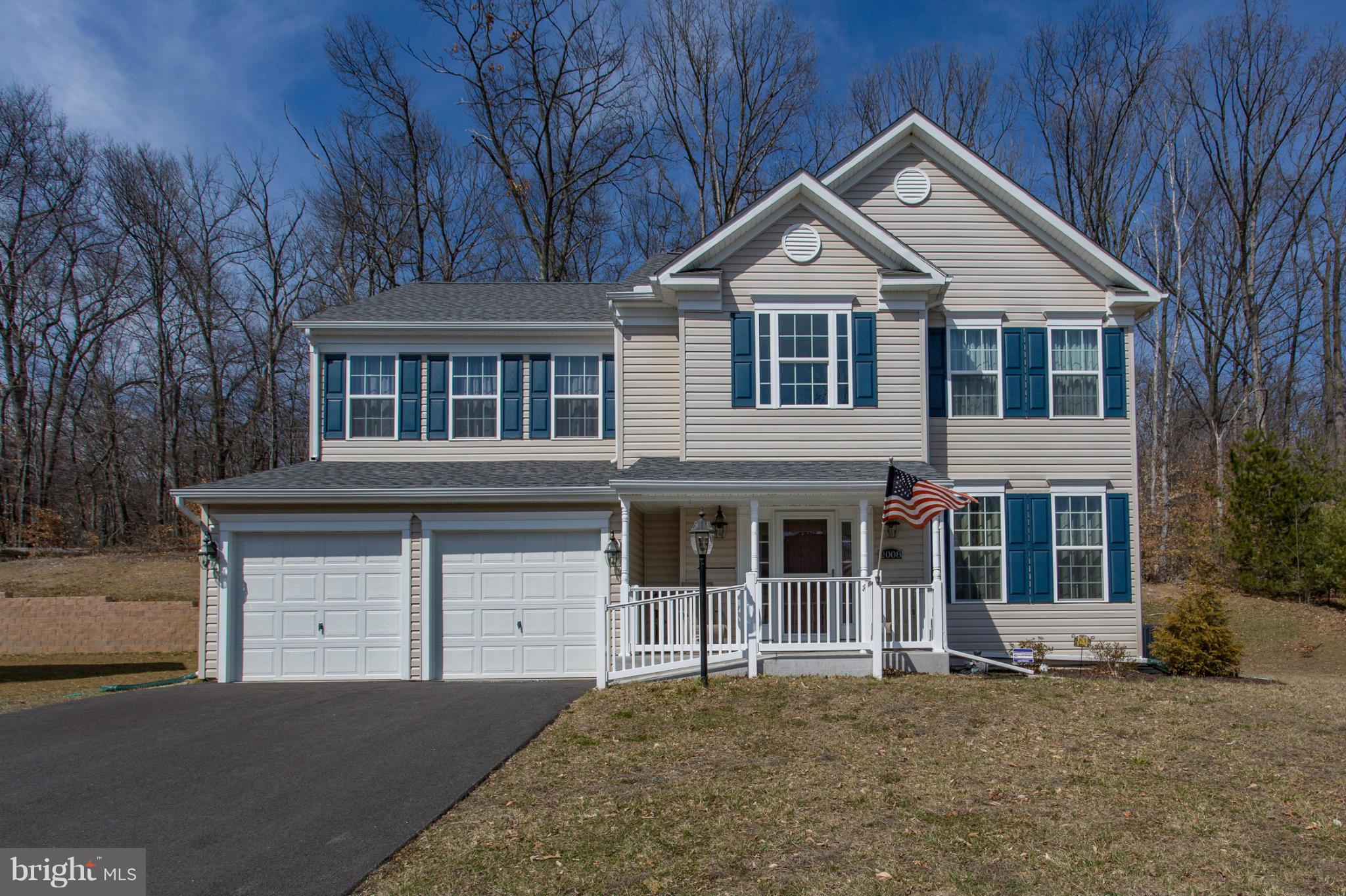 2008 Cassidy Court Point of Rocks, MD 21777 - Photo 2 of 30 a front view of a house with a garden