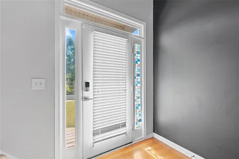 a view of a room that has a window