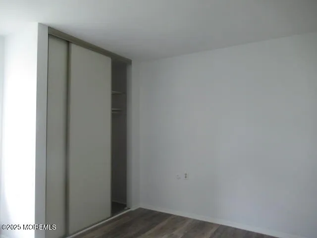 a view of hallway with closet