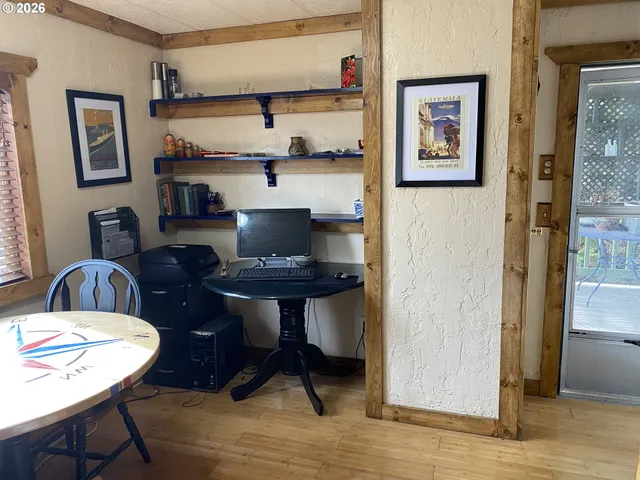 a view of a dining room with furniture