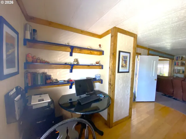 a workspace with furniture and window