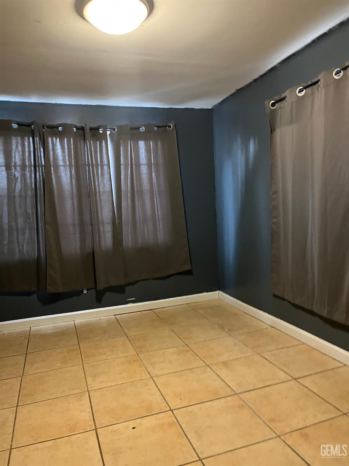 Undisclosed Address Wasco, CA 93280 - Photo 2 of 17 a view of wooden floor