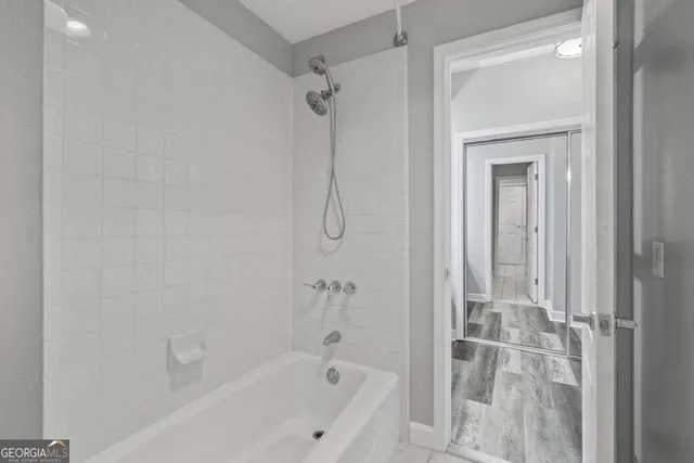 a view of an empty room with a window