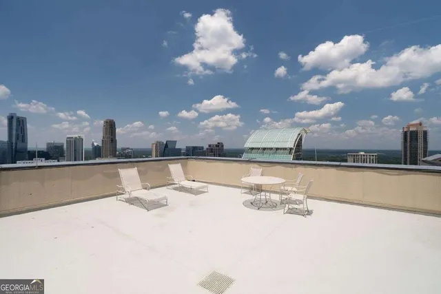 a view of a city with tall buildings