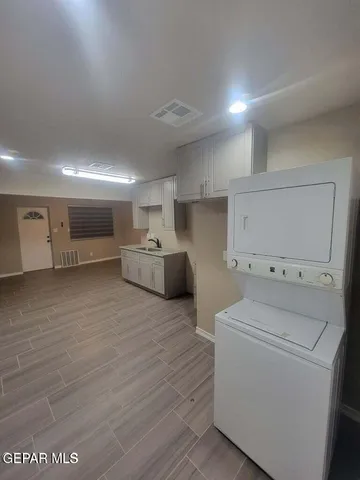 a view of kitchen and washer and dryer