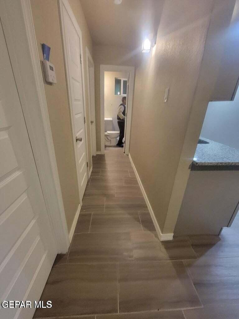 11531 Ernest Road Socorro, TX 79927 - Photo 6 of 36 a view of a hallway view with staircase