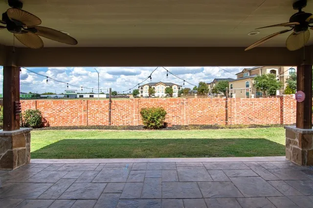 a view of a garden with an outdoor space