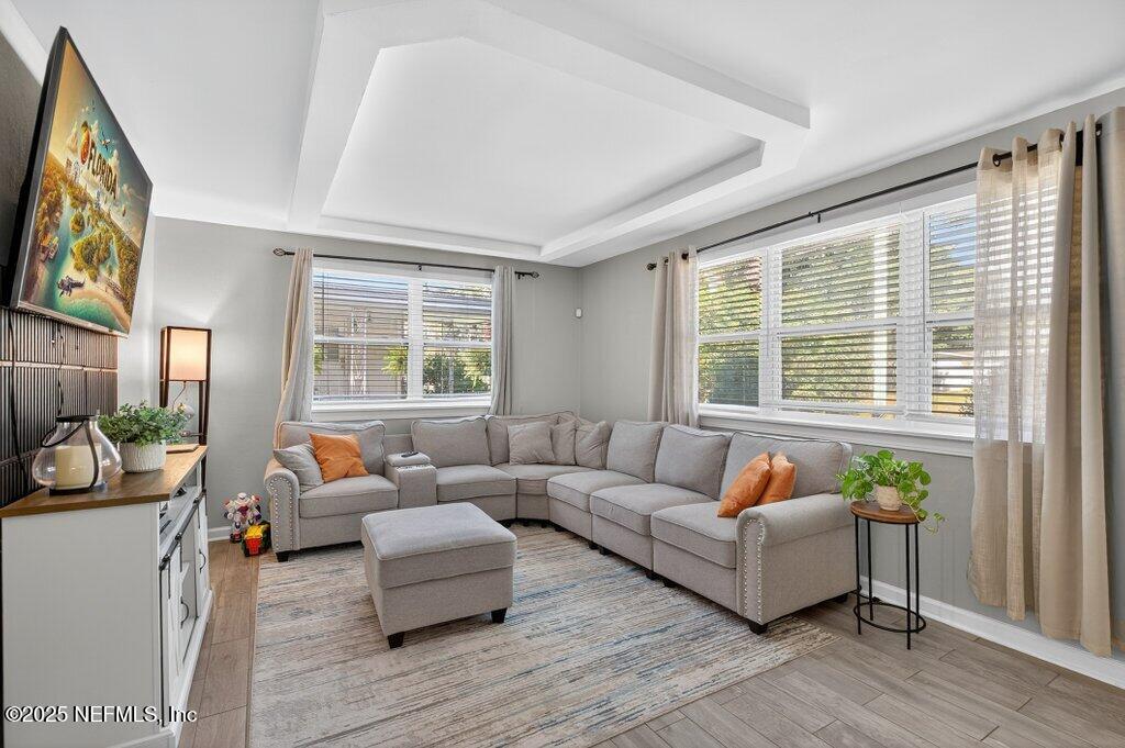 1860 Embassy Drive Jacksonville, FL 32207 - Photo 13 of 53 a living room with furniture and a large window