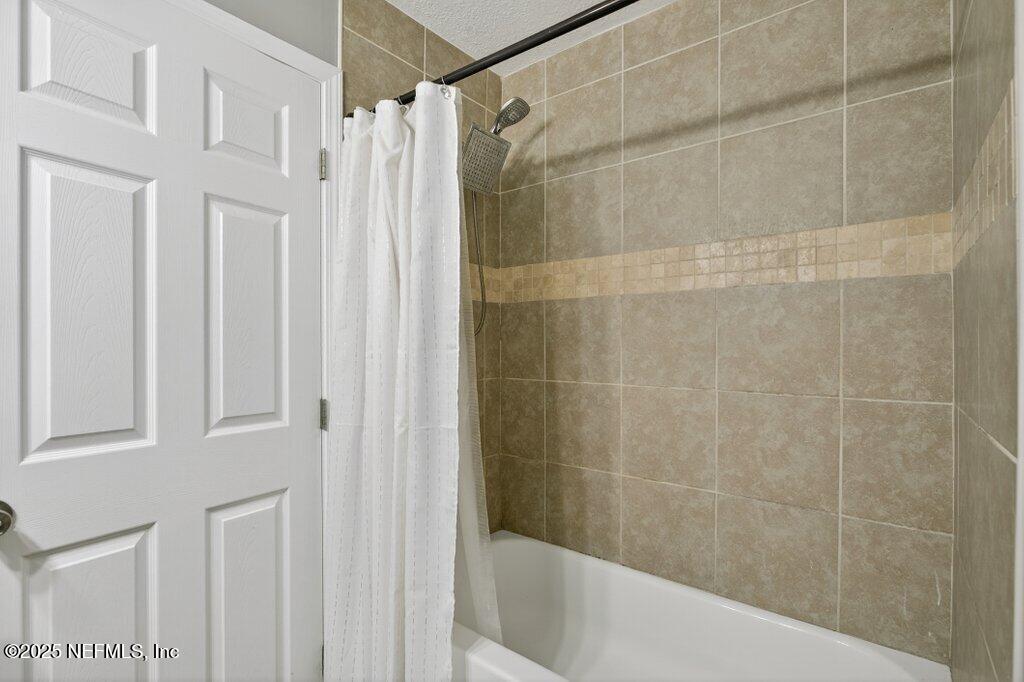 1860 Embassy Drive Jacksonville, FL 32207 - Photo 19 of 53 a bathroom with a shower