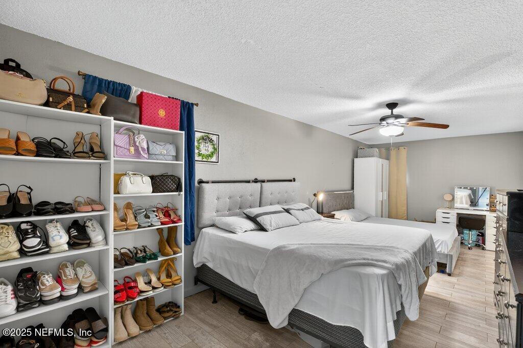 1860 Embassy Drive Jacksonville, FL 32207 - Photo 22 of 53 a bedroom with a bed and closet