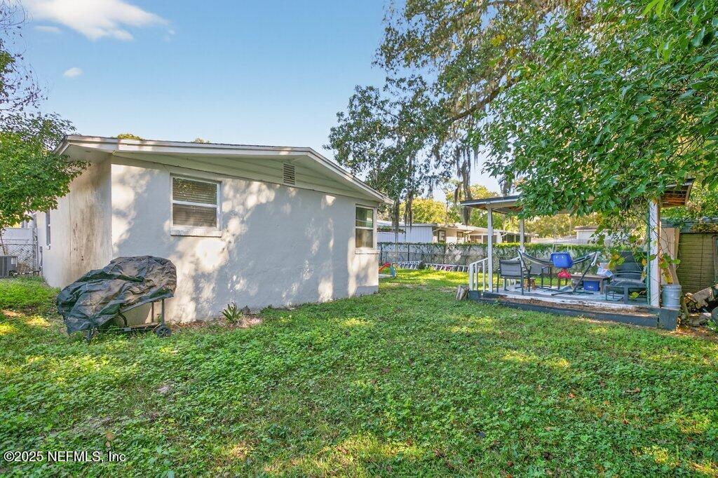 1860 Embassy Drive Jacksonville, FL 32207 - Photo 52 of 53 a view of a house with backyard and sitting area