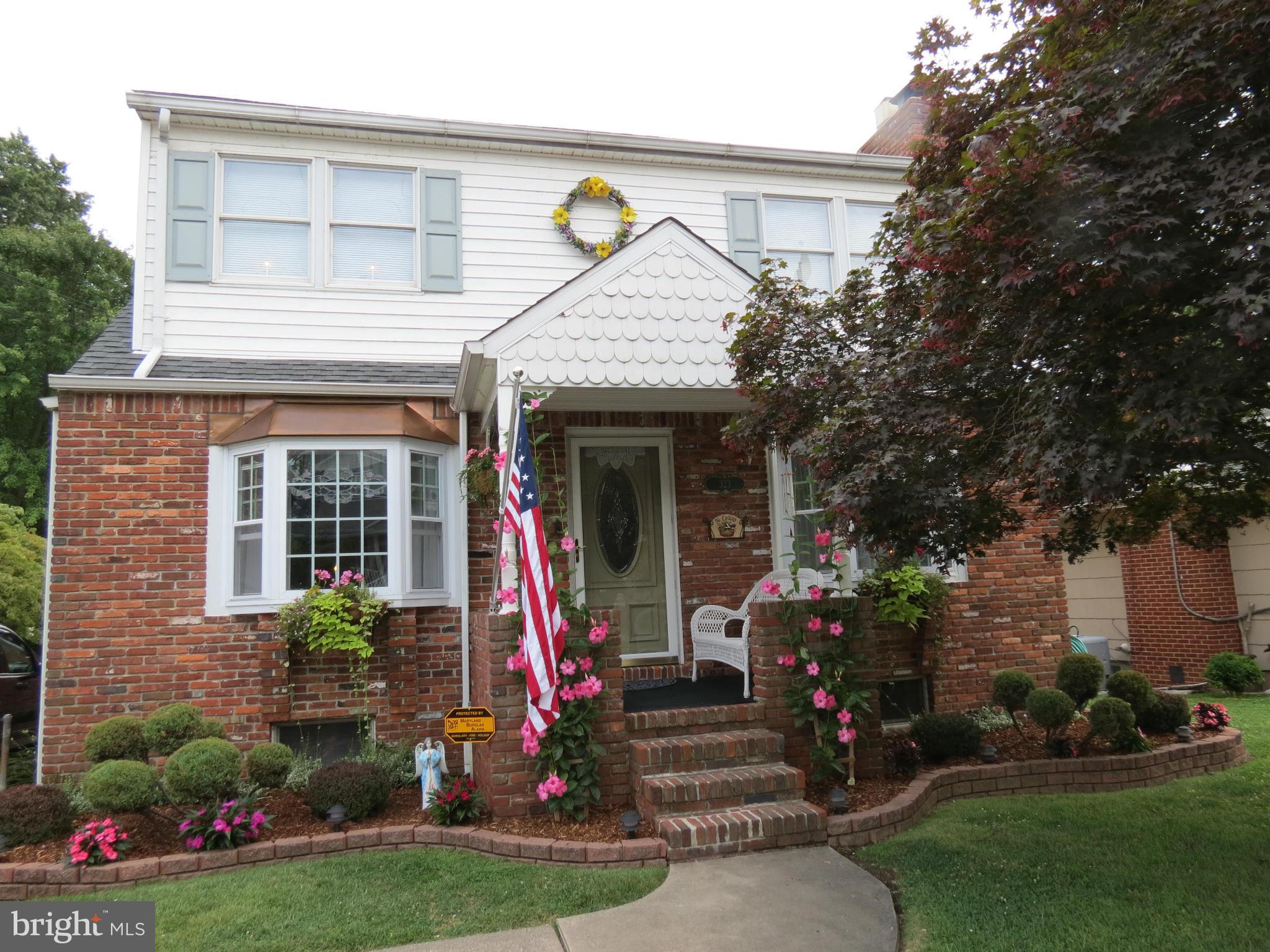 323 Nicholson Road Baltimore, MD 21221 - Photo 1 of 30 a view of a house with backyard sitting area and garden