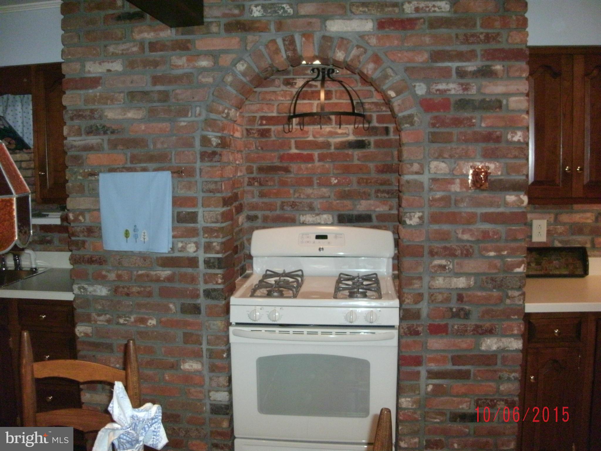 323 Nicholson Road Baltimore, MD 21221 - Photo 15 of 30 a living room with fireplace