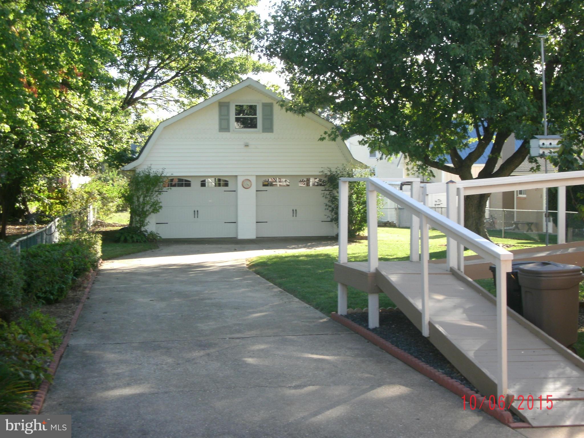 323 Nicholson Road Baltimore, MD 21221 - Photo 5 of 30 a view of a house with a yard