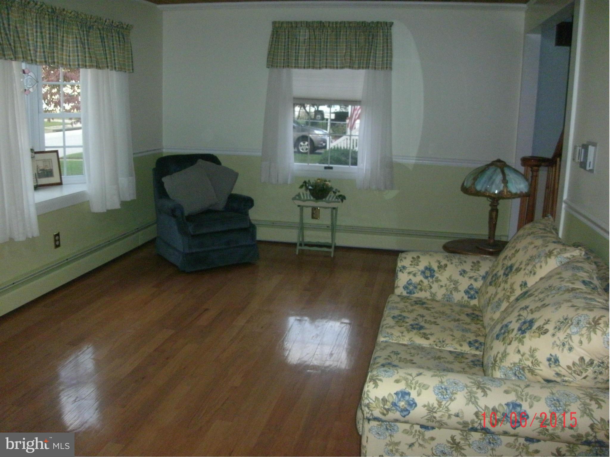 323 Nicholson Road Baltimore, MD 21221 - Photo 10 of 30 a bedroom with a bed and a window