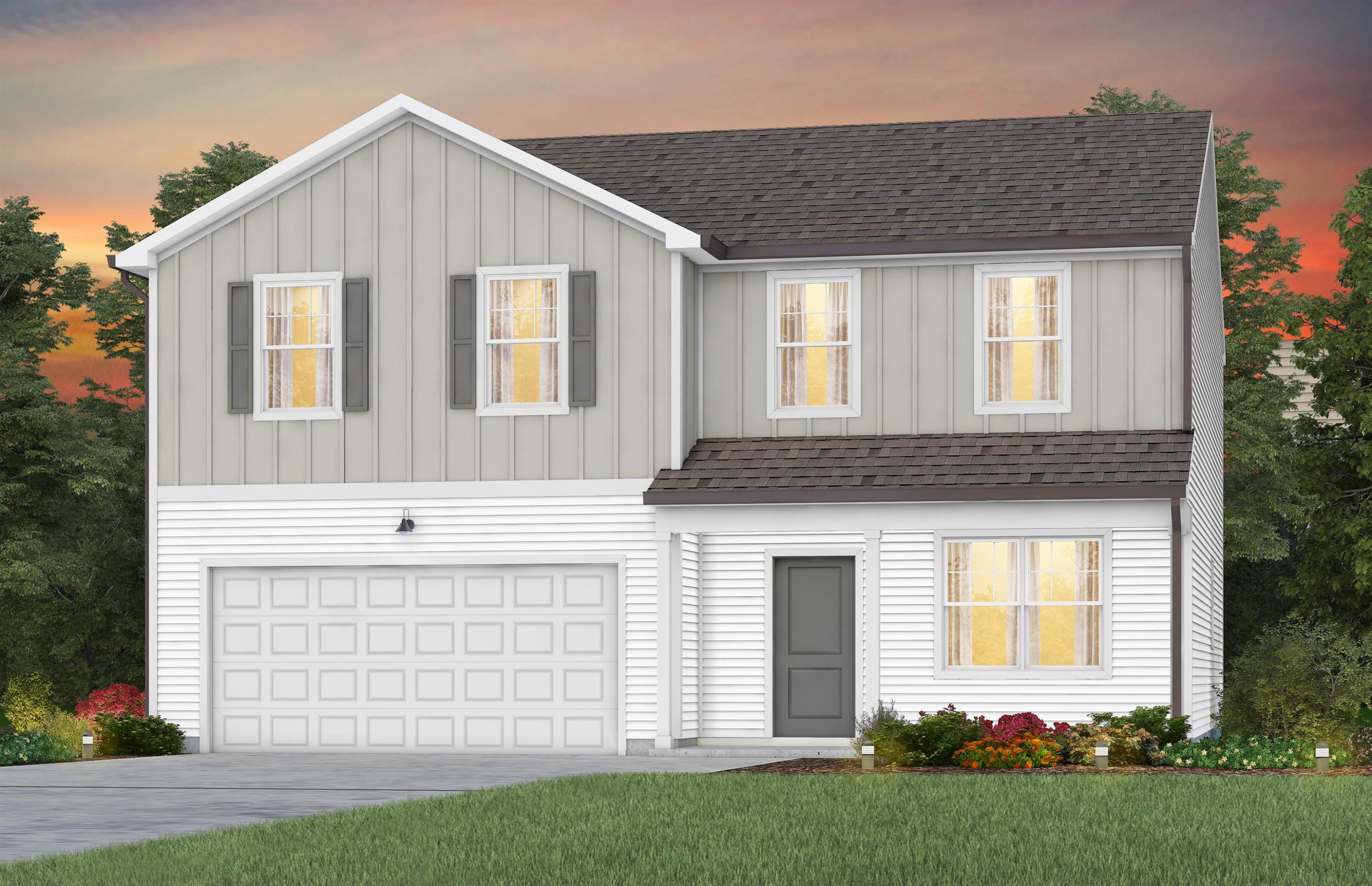 a front view of a house with a garden