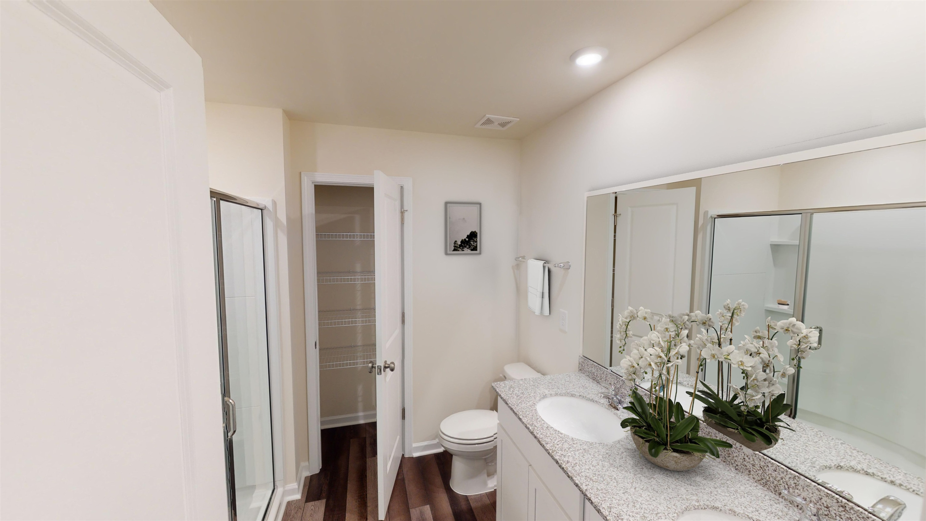 3504 Dragonfly River Raleigh, NC 27604 - Photo 26 of 27 a bathroom with a toilet sink and shower