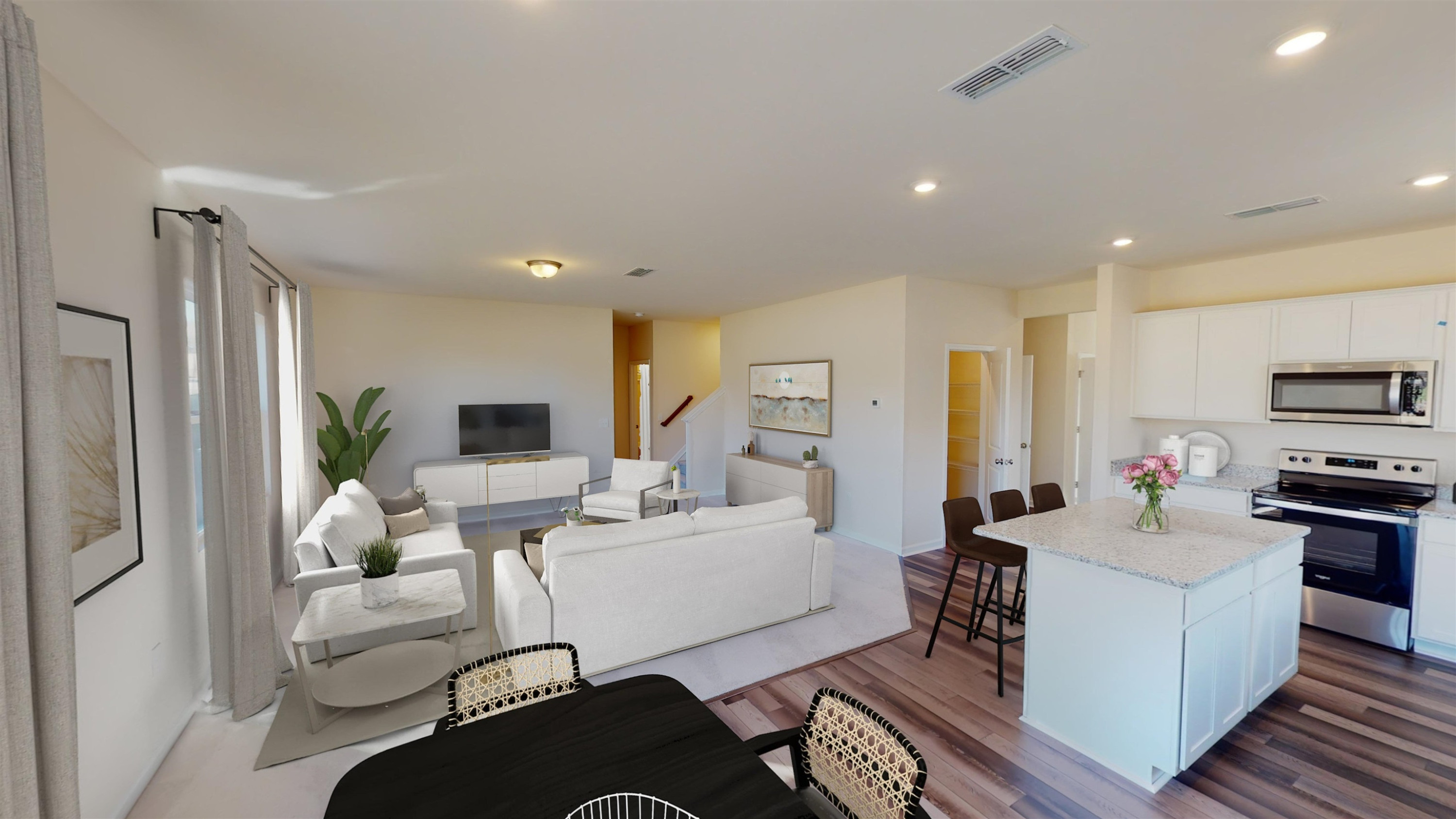 3504 Dragonfly River Raleigh, NC 27604 - Photo 8 of 27 a living room with furniture a table and a flat screen tv