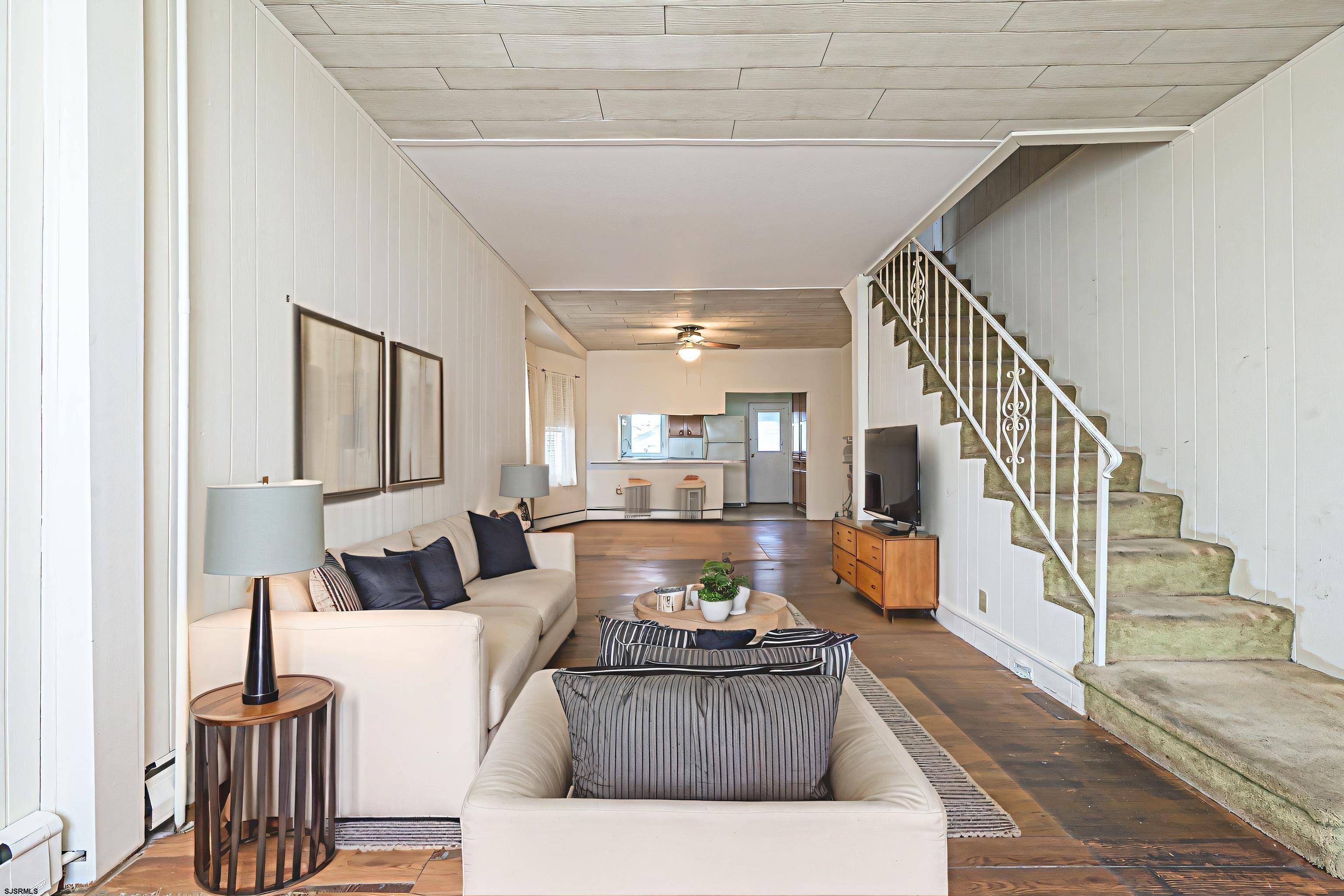 116 North Cornwall Avenue Ventnor City, NJ 08406 - Photo 5 of 28 a living room with furniture and a dining table with wooden floor