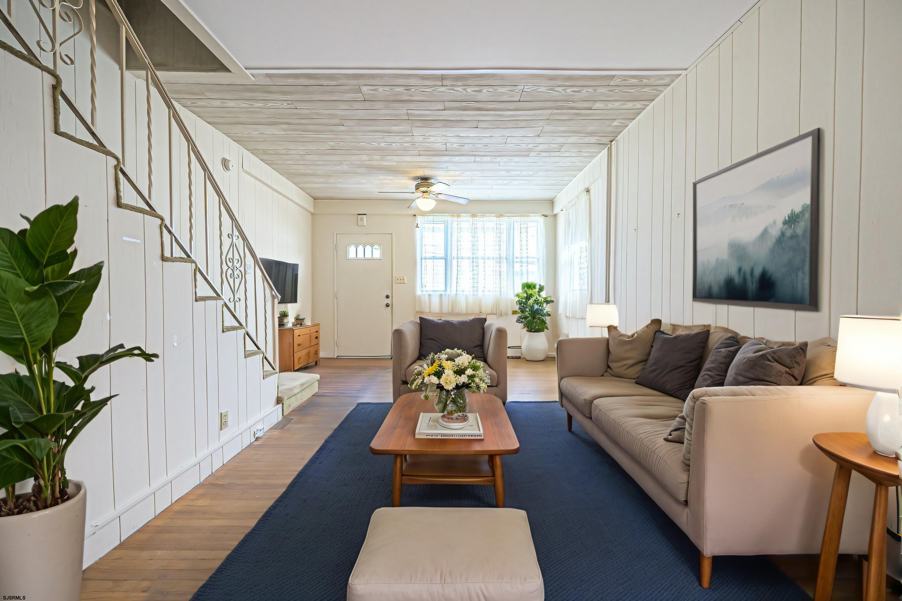 116 North Cornwall Avenue Ventnor City, NJ 08406 - Photo 8 of 28 a living room with furniture and a potted plant