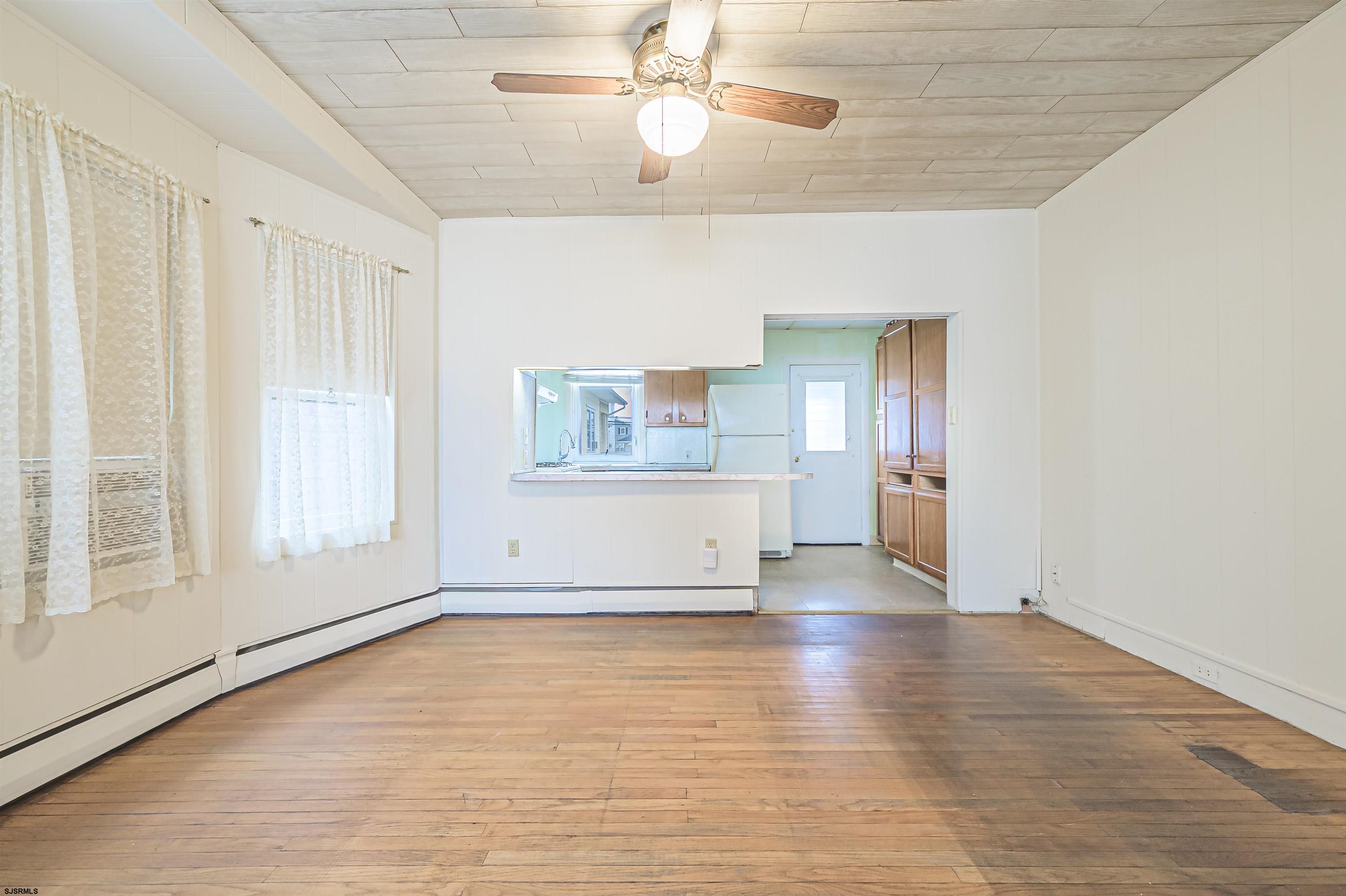 116 North Cornwall Avenue Ventnor City, NJ 08406 - Photo 9 of 28 a view of empty room with wooden floor and fan