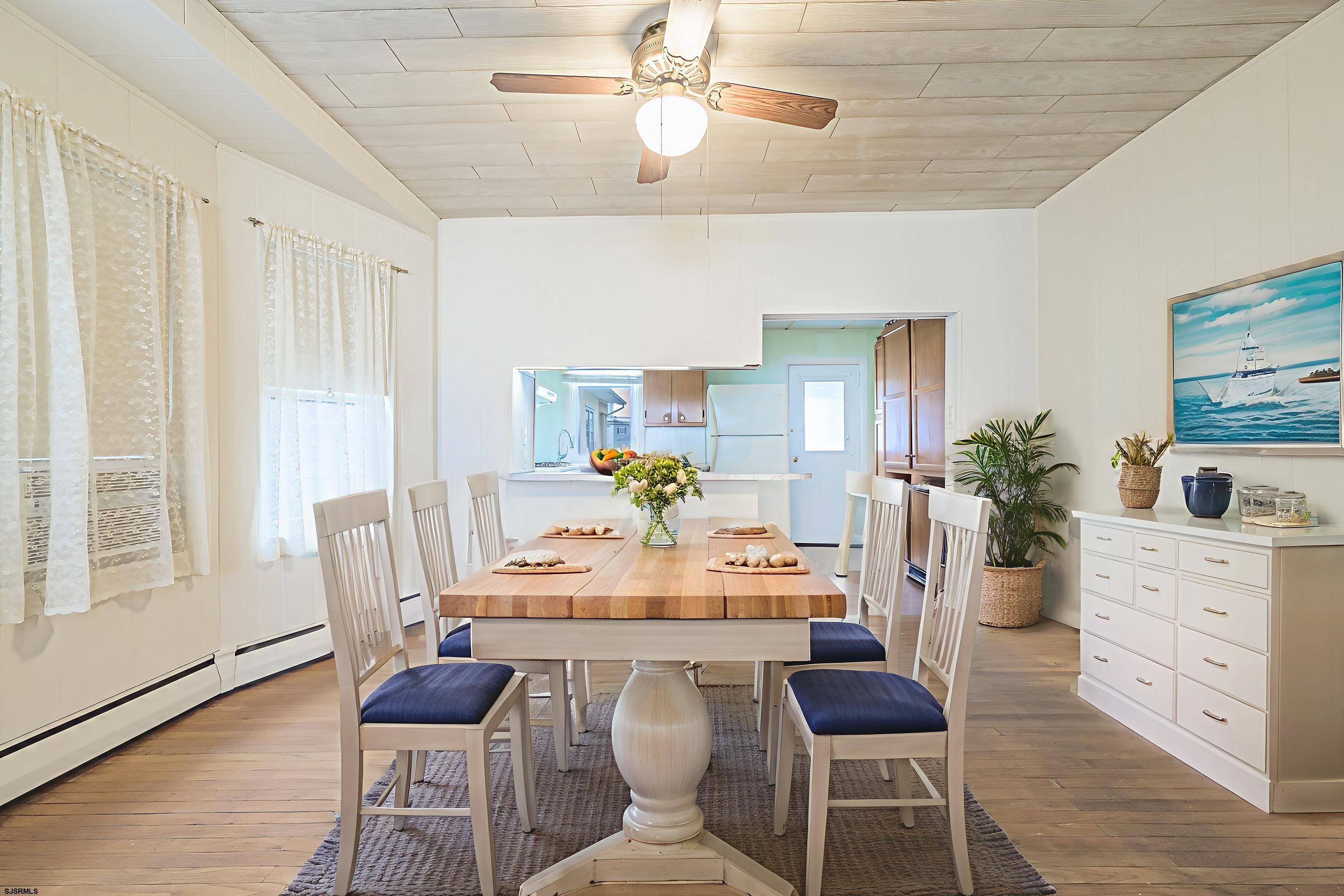 116 North Cornwall Avenue Ventnor City, NJ 08406 - Photo 10 of 28 a dining room with furniture and wooden floor