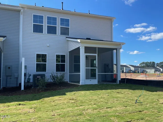 a view of a house with a swimming pool