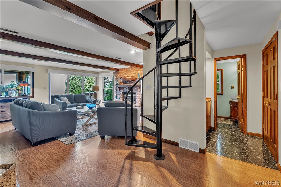 629 Lake Road Porter, NY 14174 - Photo 19 of 49 Spiral Staircase in Family room