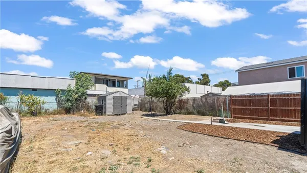 a view of a house with a snow in the yard